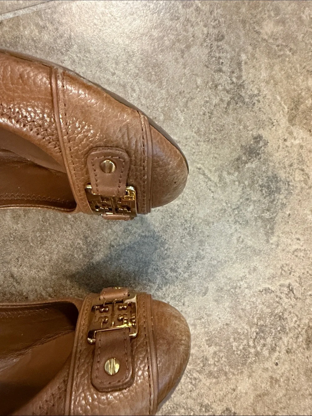 Tory Burch Cognac Leather Logo Cap-Toe Heels- worn on the front